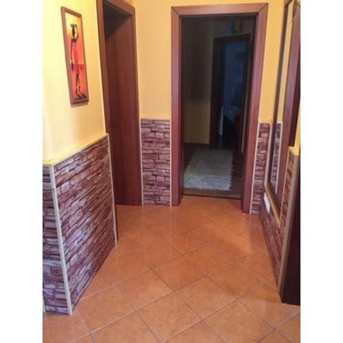 FLEXWALL PVC falpanel Karelian kőmintás barna 98×49,5 cm, beltéri falburkolat