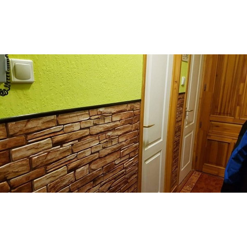 FLEXWALL PVC falpanel Karelian kőmintás barna 98×49,5 cm, beltéri falburkolat